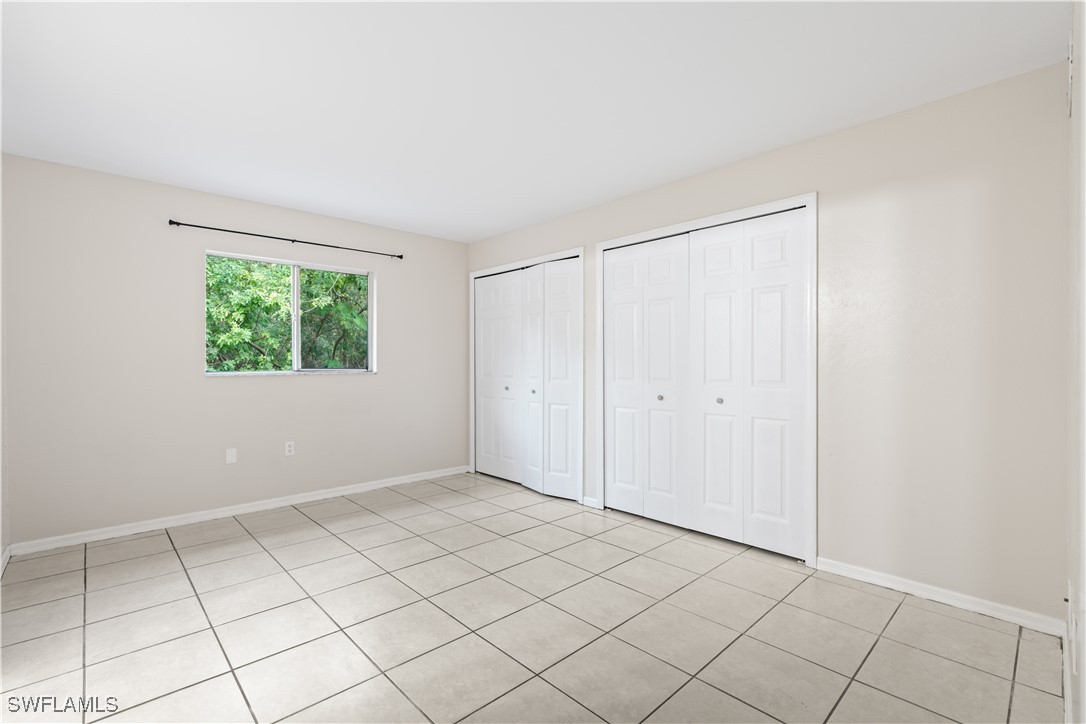209 Meadow Road Lehigh Acres, FL 33973 - Photo 25 of 48 a view of room with window