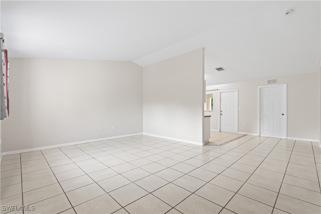 209 Meadow Road Lehigh Acres, FL 33973 - Photo 28 of 48 a view of an empty room