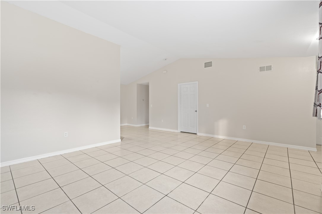 209 Meadow Road Lehigh Acres, FL 33973 - Photo 29 of 48 a view of an empty room