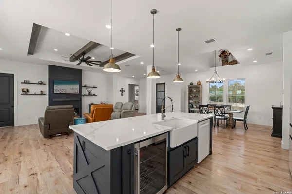 a large kitchen with stainless steel appliances kitchen island a large island in the center