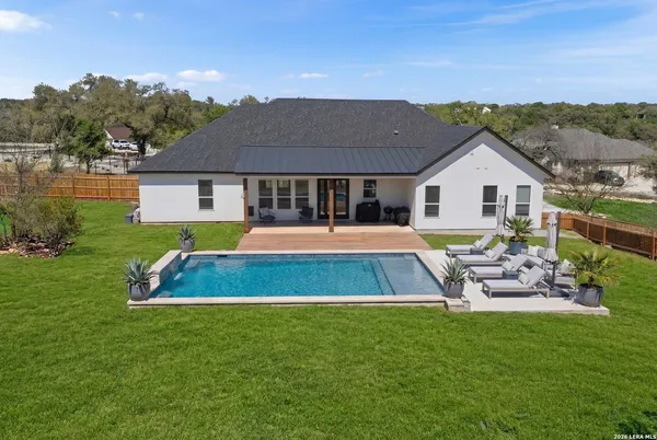 a view of house with outdoor space and yard