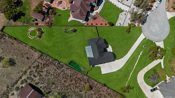 an aerial view of a tennis ground
