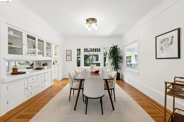 a kitchen with stainless steel appliances granite countertop a sink and a refrigerator