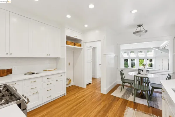 a view of a dining room with furniture and window