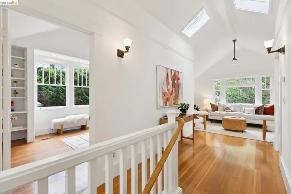 a view of kitchen and dining room with wooden floor