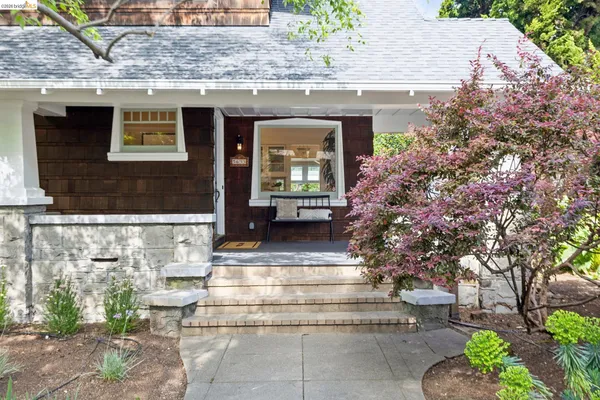 a very nice looking room with a large window and dining area