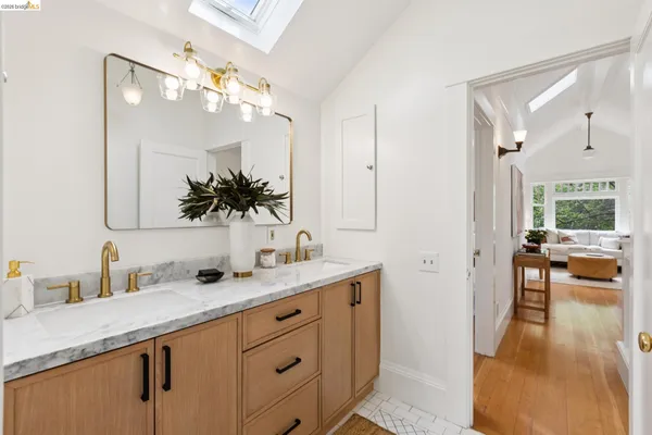 a view of a backyard with sitting area furniture and garden