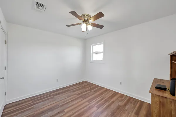 a bathroom with a toilet sink and a shower