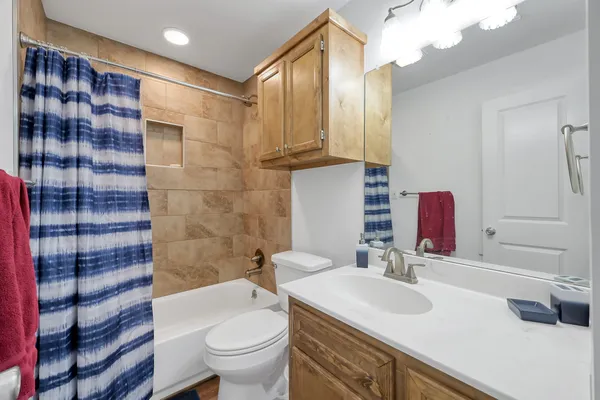 an aerial view of residential house with outdoor space