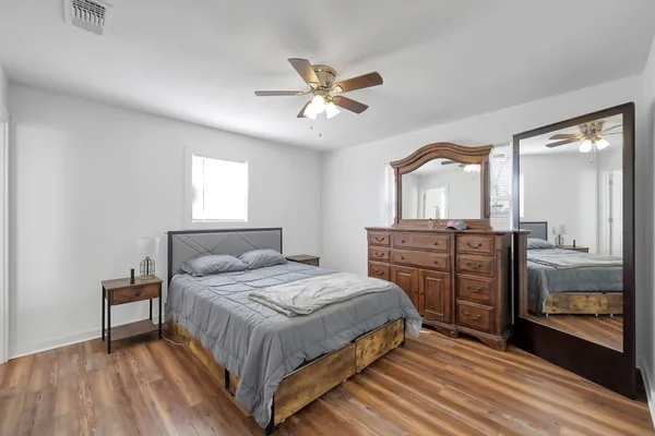 an aerial view of ocean with residential house