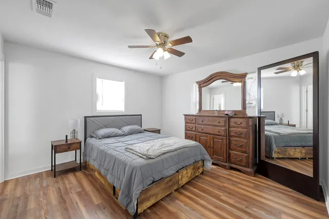 an aerial view of ocean with residential house