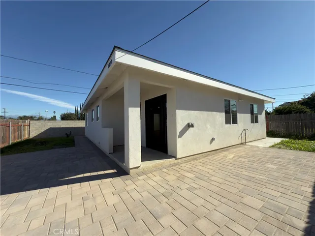a front view of a house with garage