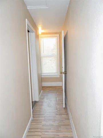 a swimming pool with trees in the background
