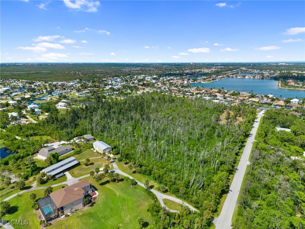 18181 Pioneer Road Fort Myers, FL 33908 - Photo 11 of 22 an aerial view of residential houses with city view