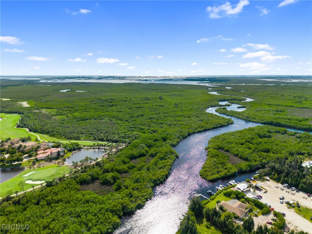 18181 Pioneer Road Fort Myers, FL 33908 - Photo 20 of 22 a view of a golf course with a lake