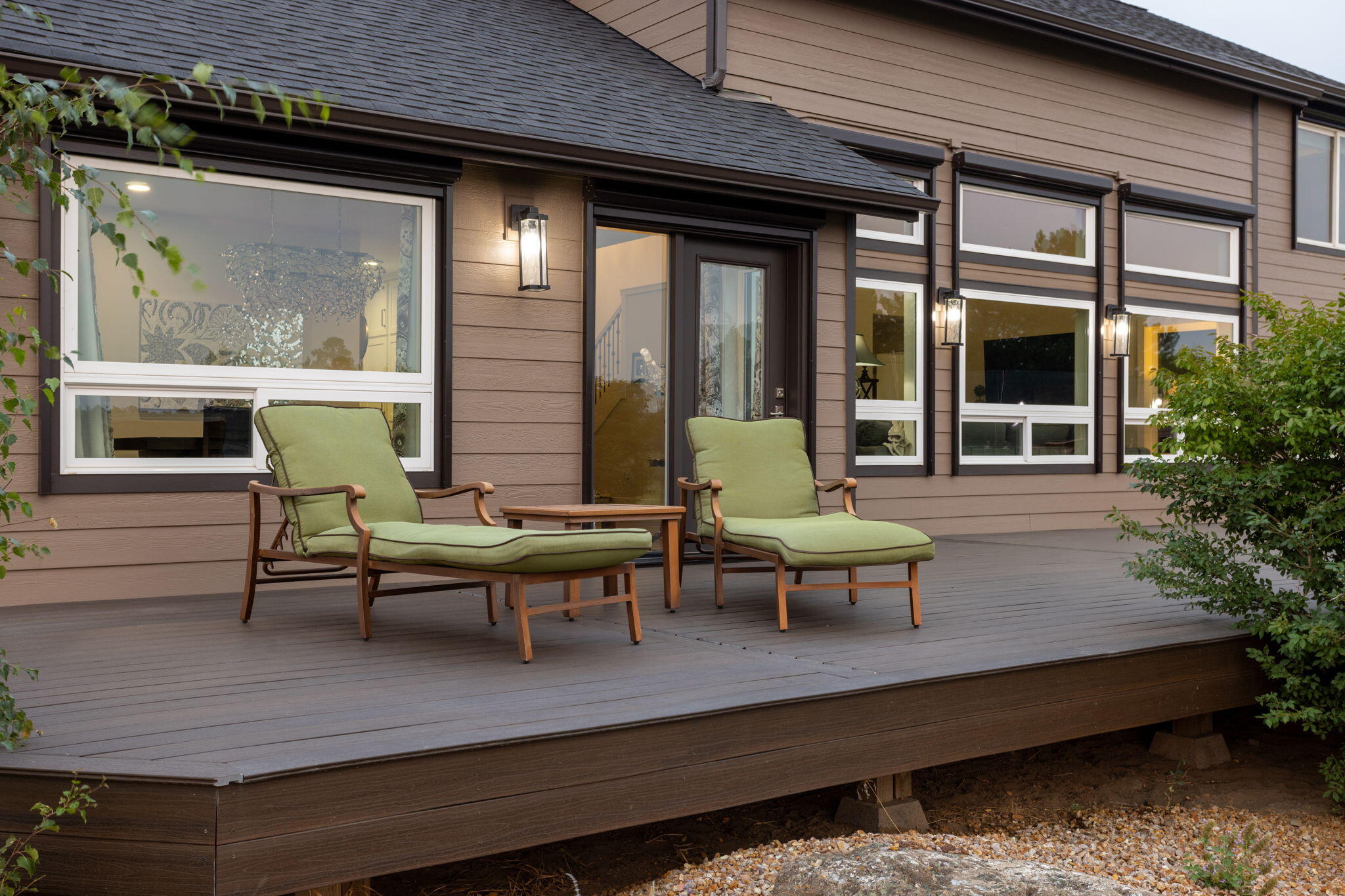 21655 Northeast Butler Market Road Bend, OR 97701 - Photo 2 of 34 a view of a patio with couple of chairs and a table