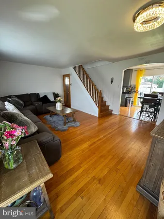 a living room with furniture and a table
