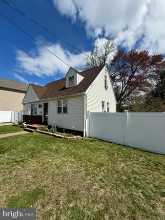a view of a back yard of the house