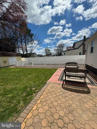a view of a terrace with a yard