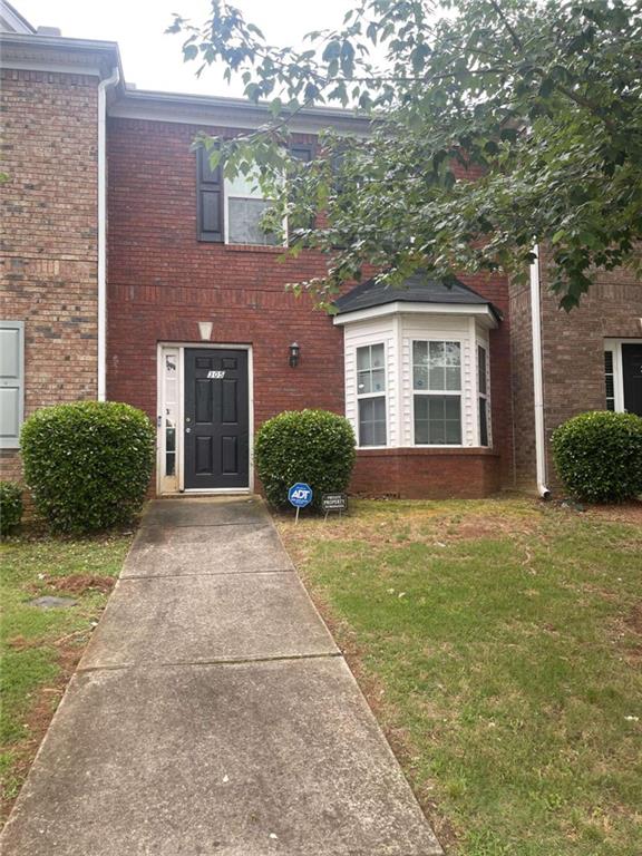 7712 Autry Circle Douglasville, GA 30134 - Photo 1 of 1 a house view with a outdoor space