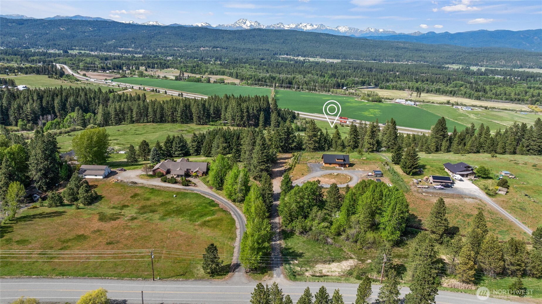66-x4 Upper Peoh Point Road Cle Elum, WA 98922 - Photo 26 of 32 a view of a lake with a mountain in the background