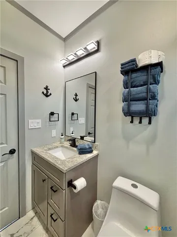 a bathroom with a shower and a sink