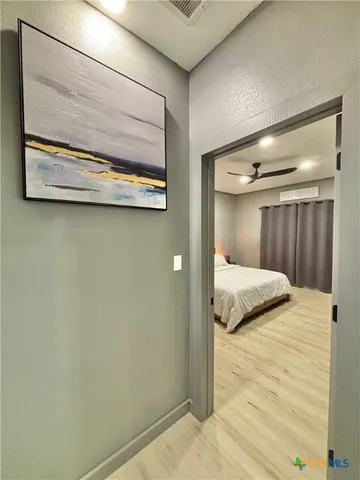 a bedroom with a bed and furniture