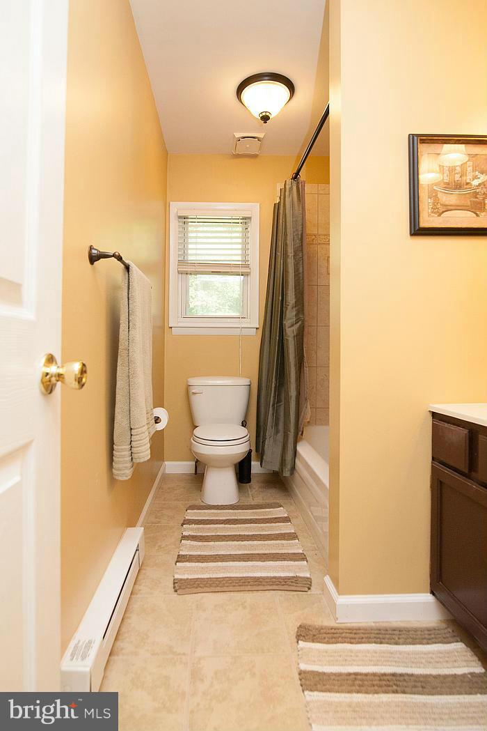 3244 Lineboro Road Manchester, MD 21102 - Photo 12 of 29 a bathroom with a sink and a toilet