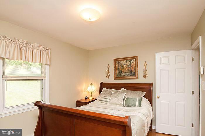 3244 Lineboro Road Manchester, MD 21102 - Photo 16 of 29 a bedroom with a bed and a window