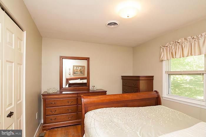 3244 Lineboro Road Manchester, MD 21102 - Photo 17 of 29 a bedroom with a bed and a window