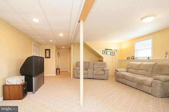 3244 Lineboro Road Manchester, MD 21102 - Photo 19 of 29 a living room with furniture and a large window