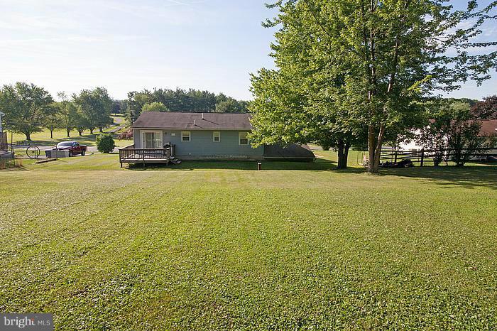 3244 Lineboro Road Manchester, MD 21102 - Photo 24 of 29 a view of a lake with a house