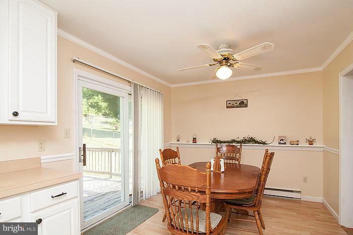 3244 Lineboro Road Manchester, MD 21102 - Photo 4 of 29 a view of a dining room with furniture window and outside view