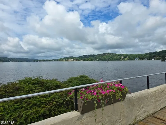 a view of a lake from a balcony