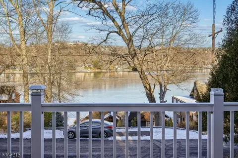a view of a brick building next to a yard