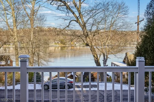 a view of a brick building next to a yard