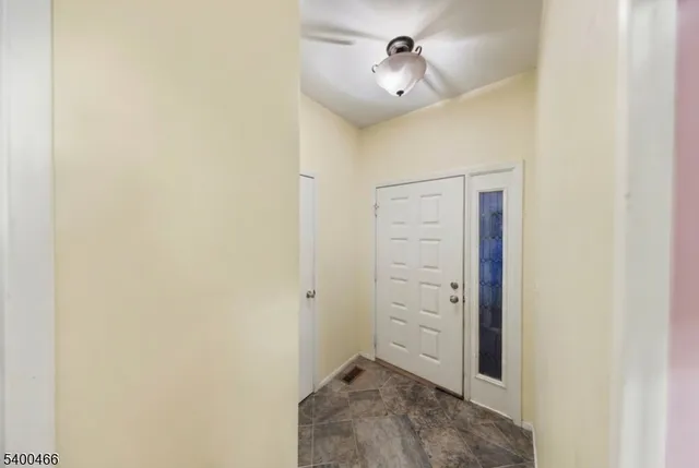 a view of a decorative light in a hallway