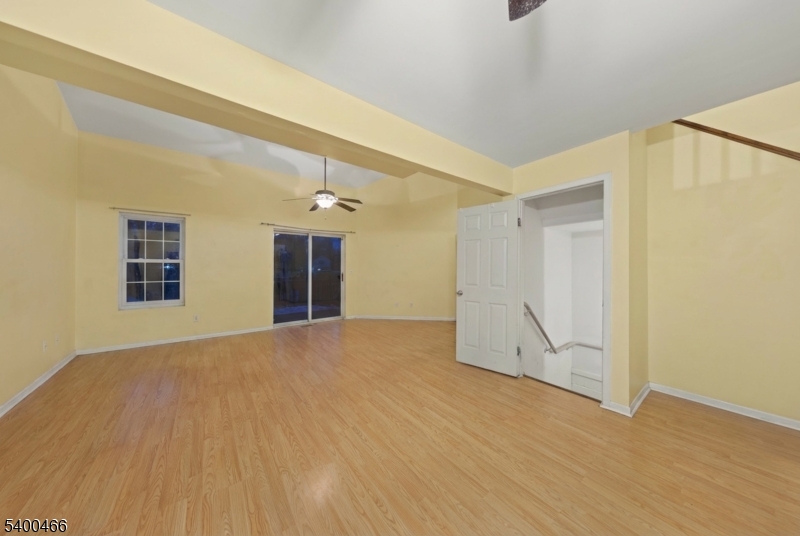 32 Rhea Run Newton, NJ 07860 - Photo 19 of 31 a view of empty room with wooden floor and fan