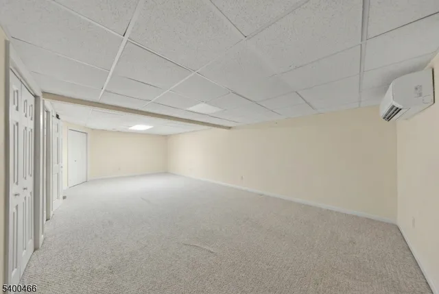 a bed room with furniture and a window