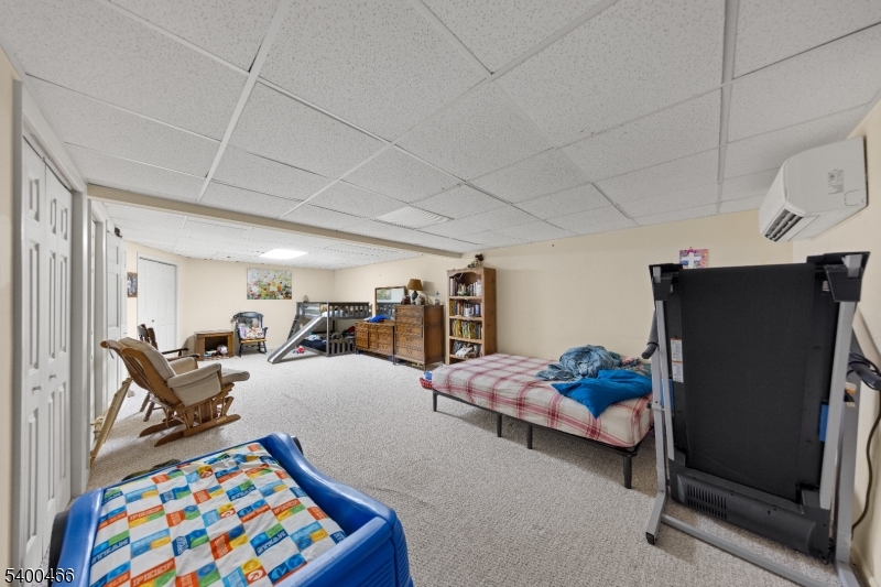 32 Rhea Run Newton, NJ 07860 - Photo 24 of 31 a bed room with furniture and a window