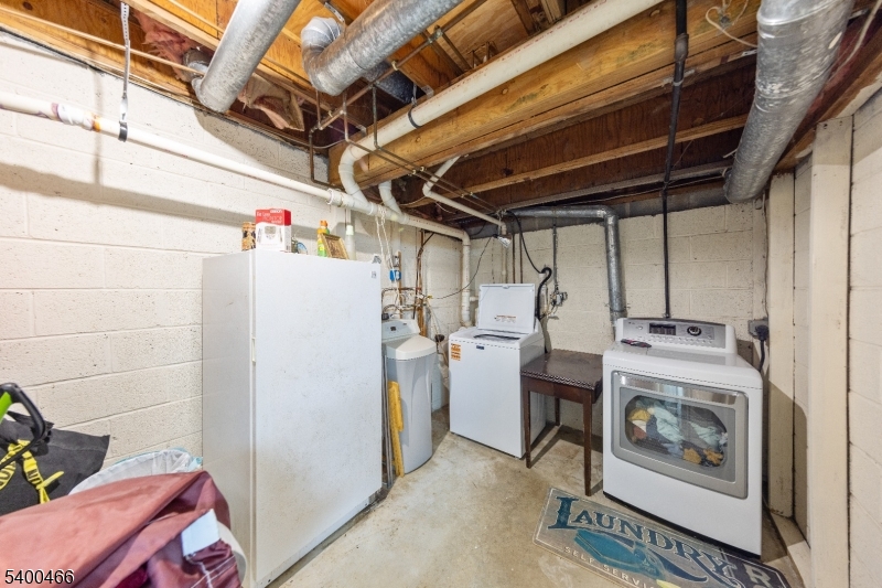 32 Rhea Run Newton, NJ 07860 - Photo 25 of 31 a utility room with dryer and washer