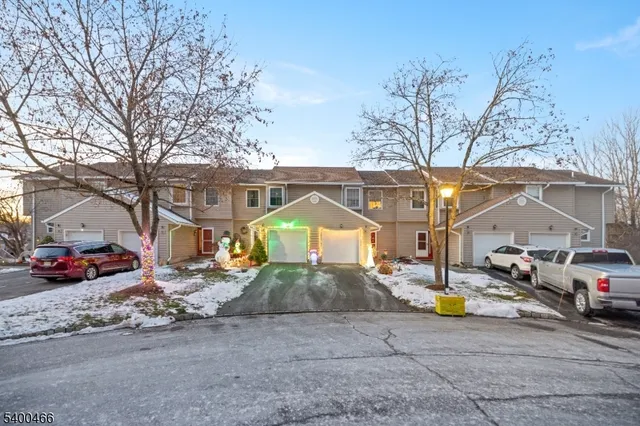 a front view of a building with glass windows