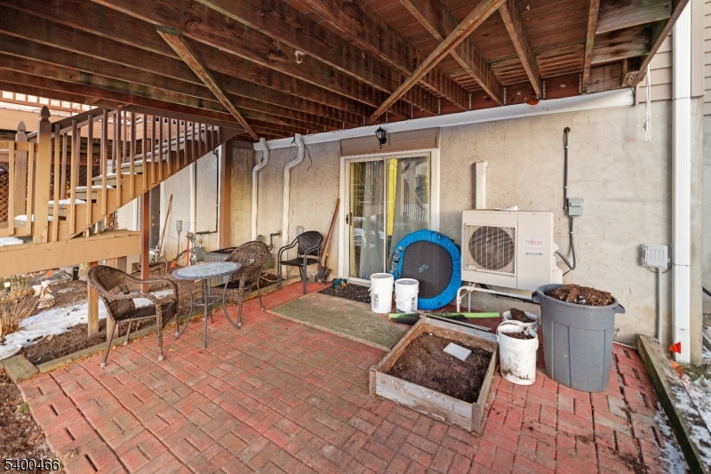 32 Rhea Run Newton, NJ 07860 - Photo 4 of 31 a living room with furniture a rug and a wooden floor