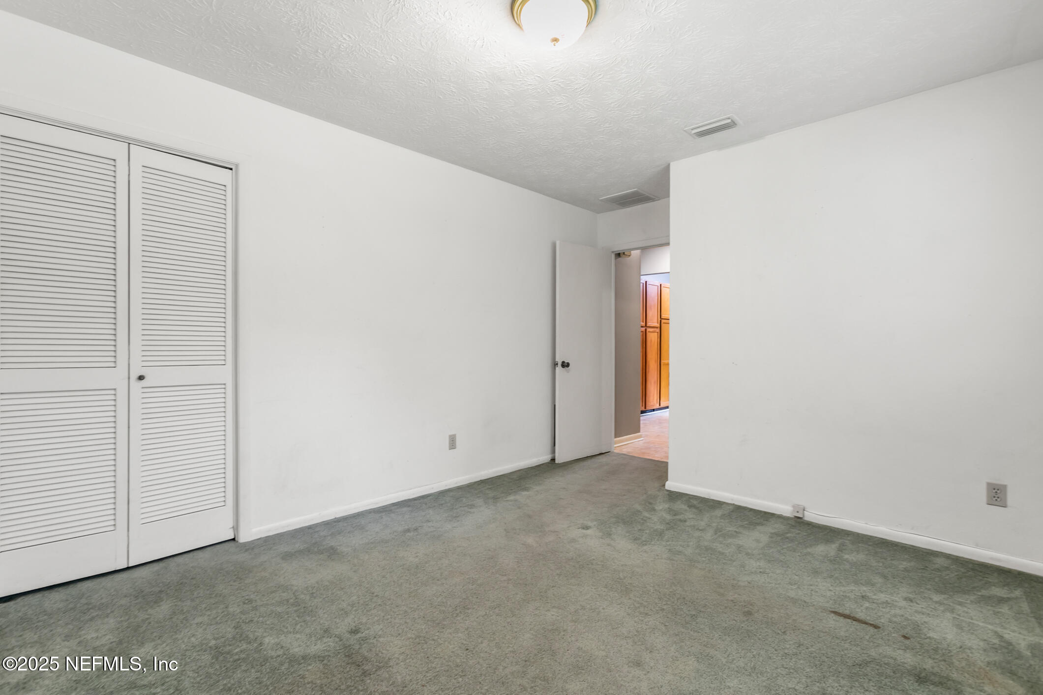 12657 Aladdin Road Jacksonville, FL 32223 - Photo 26 of 47 a view of an empty room