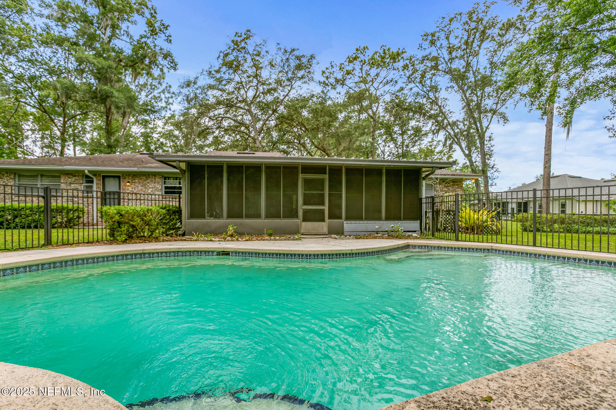 12657 Aladdin Road Jacksonville, FL 32223 - Photo 34 of 47 a view of a house with swimming pool and a yard