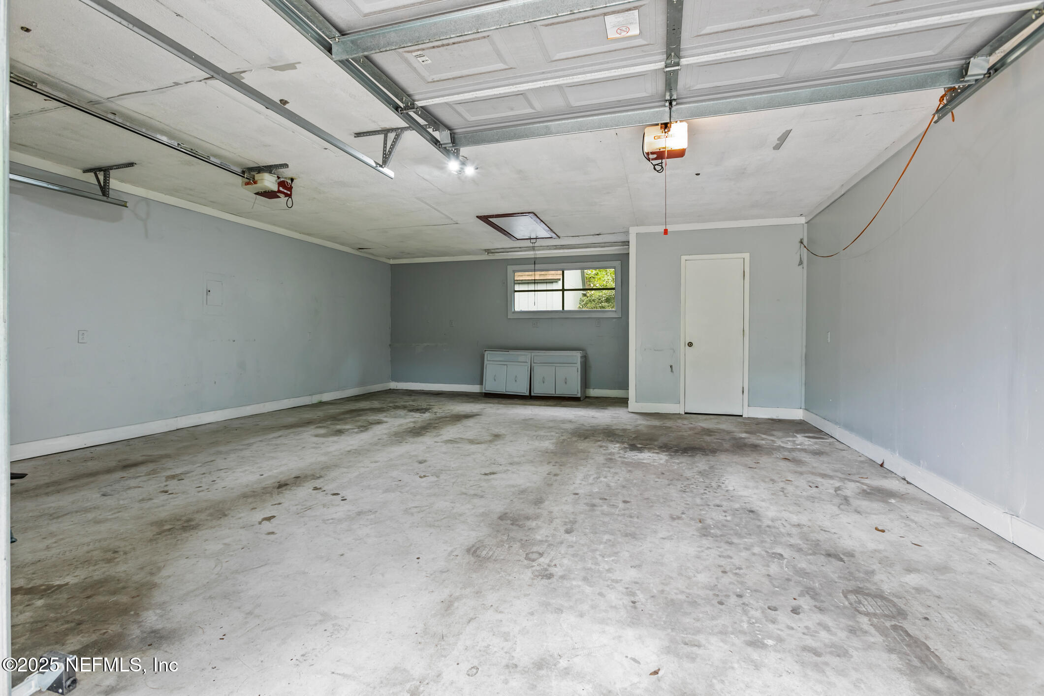 12657 Aladdin Road Jacksonville, FL 32223 - Photo 39 of 47 a view of a room with a ceiling fan window and a ceiling fan