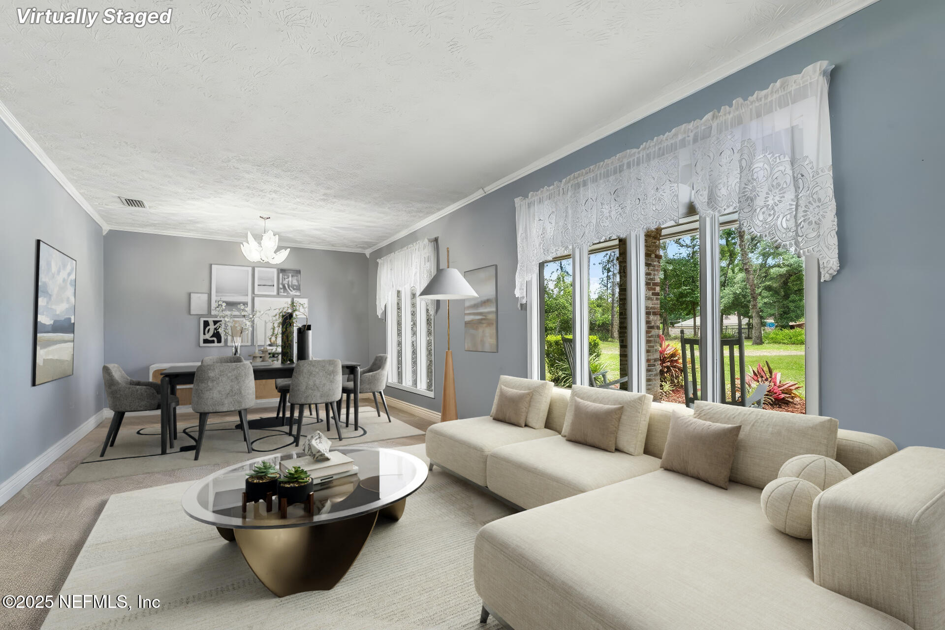 12657 Aladdin Road Jacksonville, FL 32223 - Photo 4 of 47 a living room with furniture and a potted plant