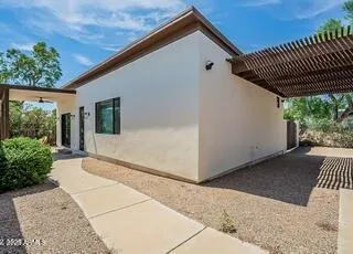 a kitchen with stainless steel appliances a refrigerator sink and stove