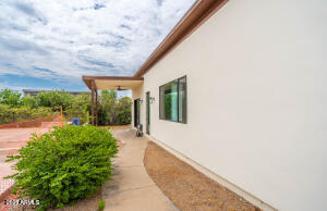3933 East Rancho Drive Paradise Valley, AZ 85253 - Photo 3 of 27 a view of a house with backyard and porch