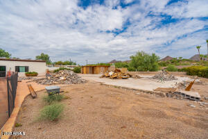 3933 East Rancho Drive Paradise Valley, AZ 85253 - Photo 6 of 27 a view of a ocean view with beach and car parked